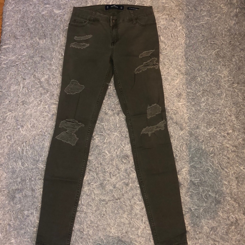 hollister army green jeans with rips